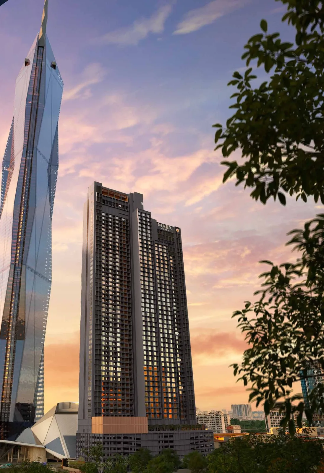 Maba Suitez twin towers beside Merdeka 118 at dusk