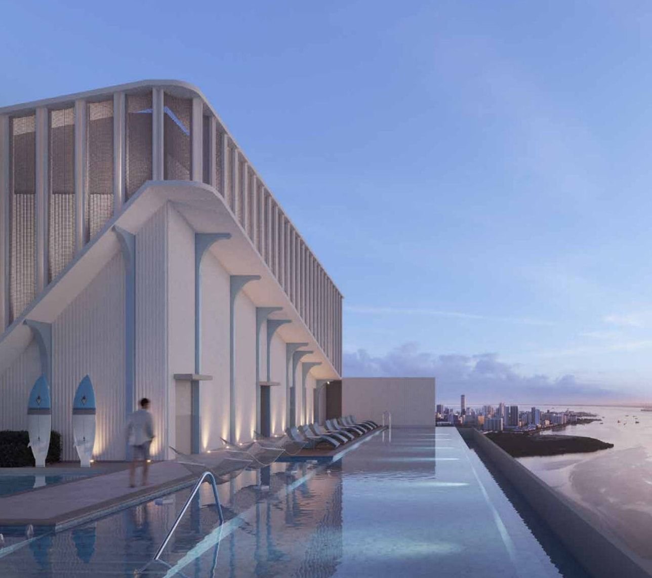 Artist's impression of the rooftop infinity pool facing the sea at dusk